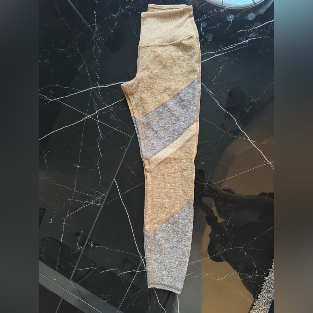 Alo tan color leggings- very comfortable S size. Worn one time because too big